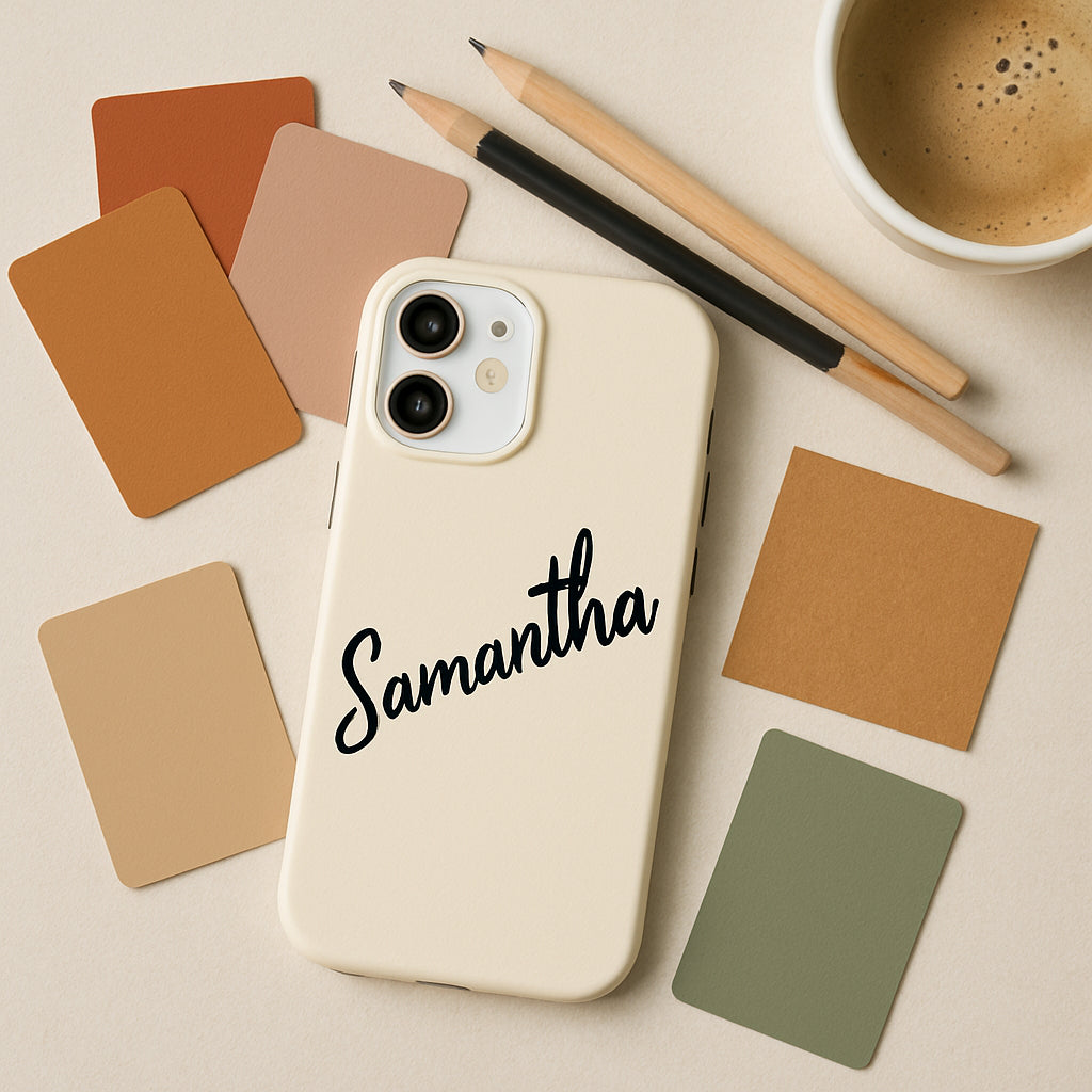 A stylish flat‑lay of a custom name phone case surrounded by design swatches, pencils, and a coffee cup. Alt: custom name phone case design ideas and inspiration.