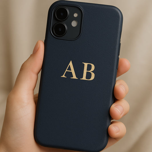 A high‑resolution mock‑up of a sleek phone case with elegant monogram initials, showing the case in a hand, soft lighting. Alt: Custom monogram phone case close‑up